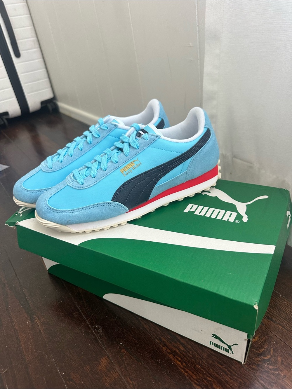 Puma Women’s Light Blue Sneakers with Navy Formstrip and Red Accent